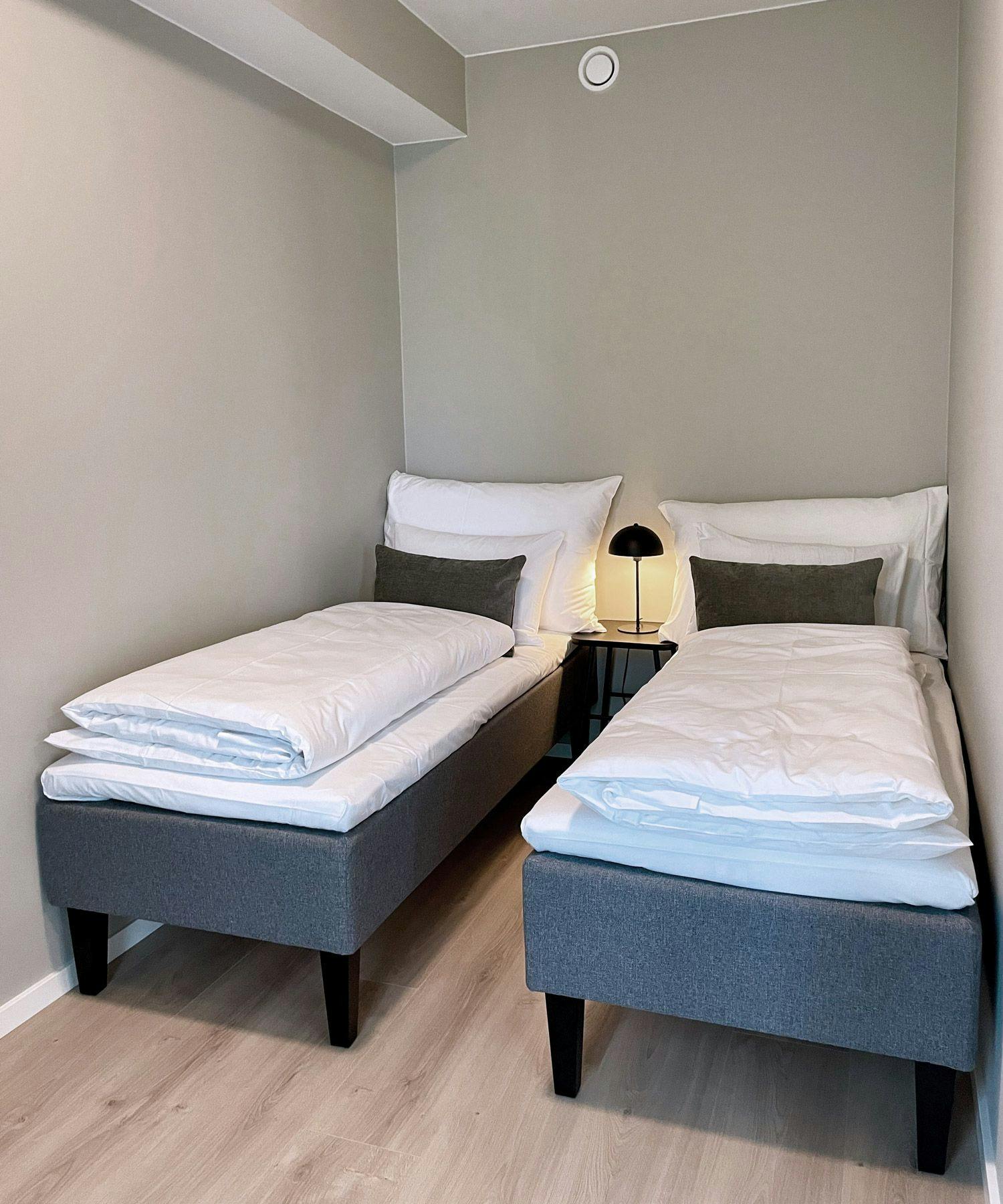 Photo: Double bedroom of premium two-bedroom apartment at Hinna location.